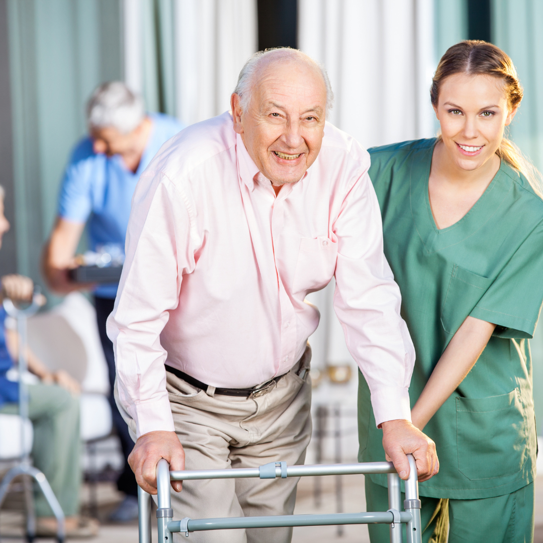 Caregiver assisting an elderly man using a walker, representing compassionate and reliable home care in Long Beach, CA.