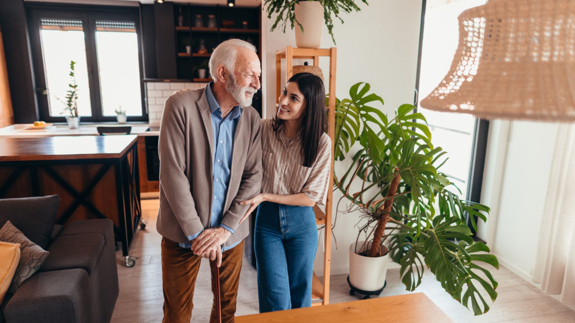 Caregiver assisting a senior man at home, reflecting Home Care in Burbank, CA