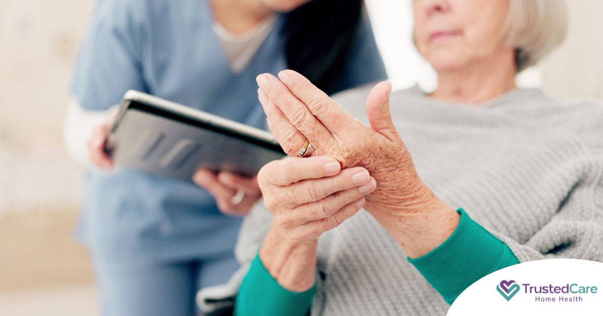 A caregiver provides in home care services to a senior with arthritis